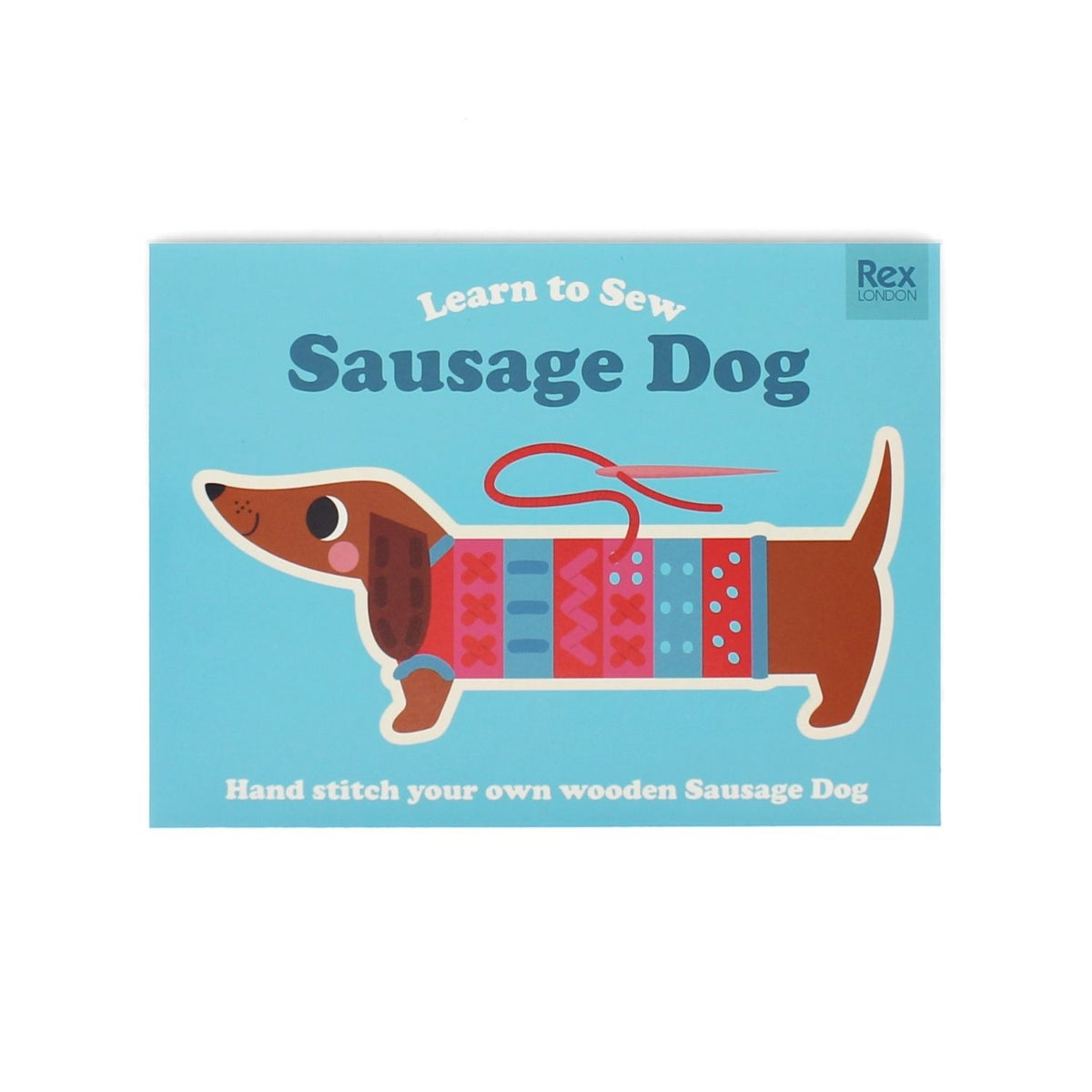 Kids sewing set featuring a wooden sausage dog stitching board, a blunt plastic needle, and four lengths of vibrant yarn for beginner craft activities.