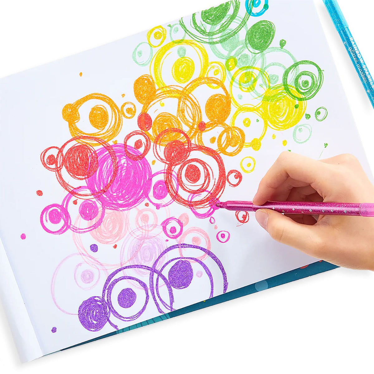 A set of 15 rainbow sparkle glitter markers in various colors, with branding and product information displayed on the packaging.
