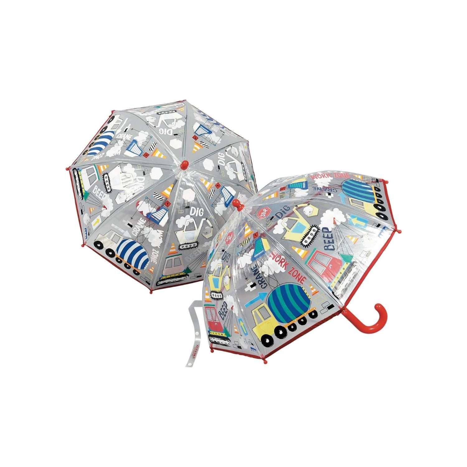 A transparent kids' umbrella with a construction theme, including illustrations of building sites, trucks, and diggers. It has a red handle and a Velcro tie.