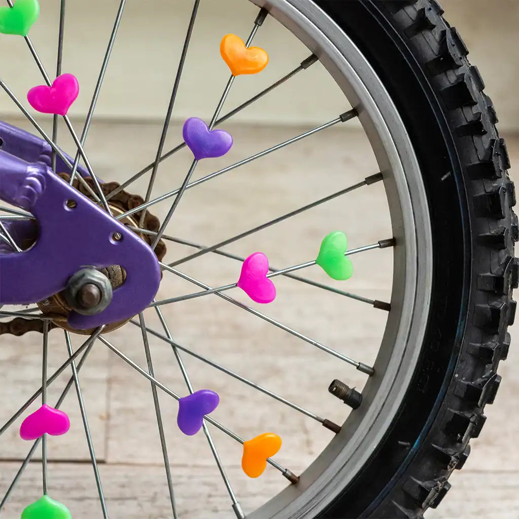 Bicycle spoke hearts on a bike wheel