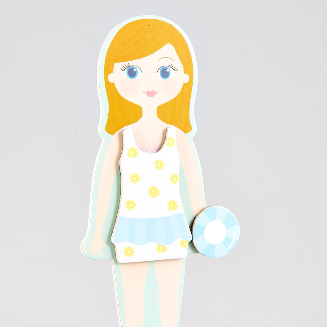 dress up doll in a swimsuit with a life preserver on a gray background