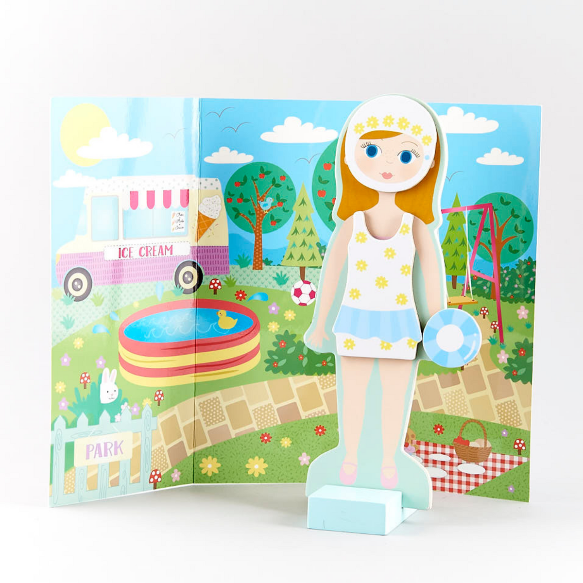 dress up doll with a park scene background