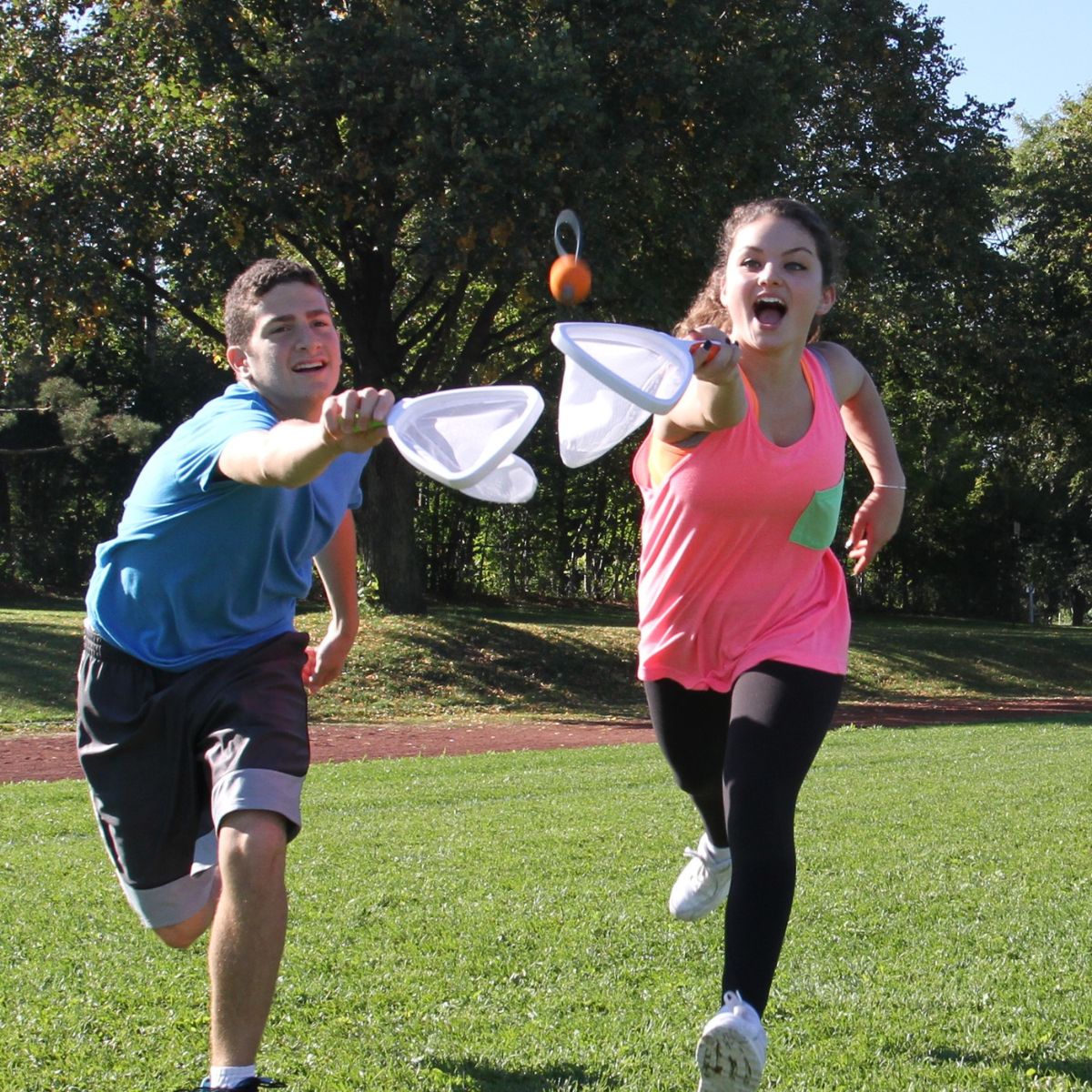 Group of Kids playing outside with Djubi Slingball