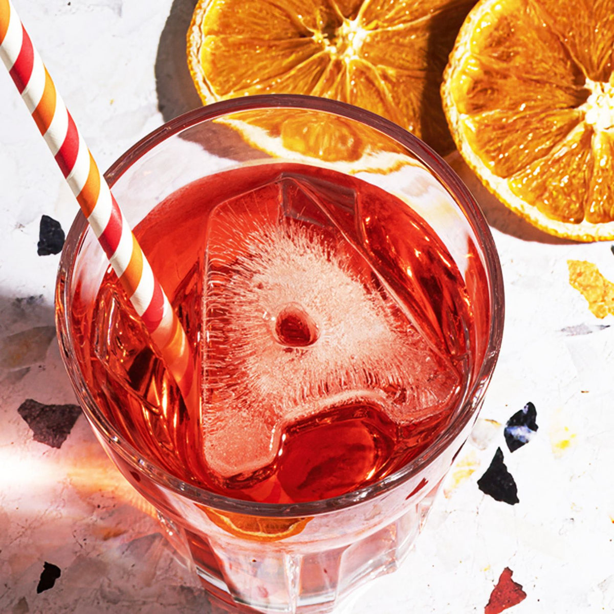 A is for Aperol! Elevate your summer spritz with our Letter A ice tray. These large, slow-melting ice letters keep your Aperol cocktails chilled without diluting the flavor.