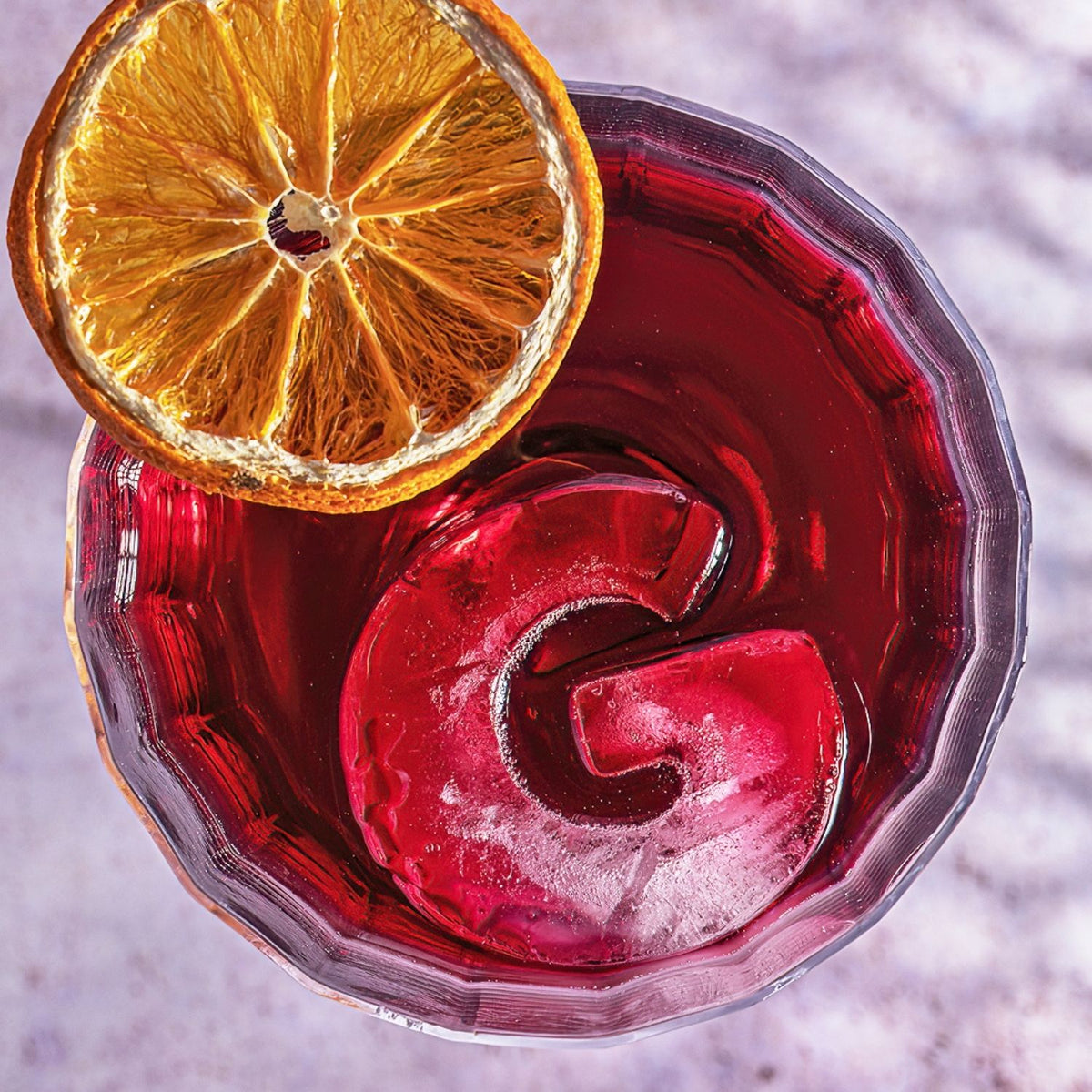 G is for Gin! Elevate your G&T with our Letter G ice tray. These large, slow-melting ice letters keep your gin cocktails perfectly chilled without watering them down.