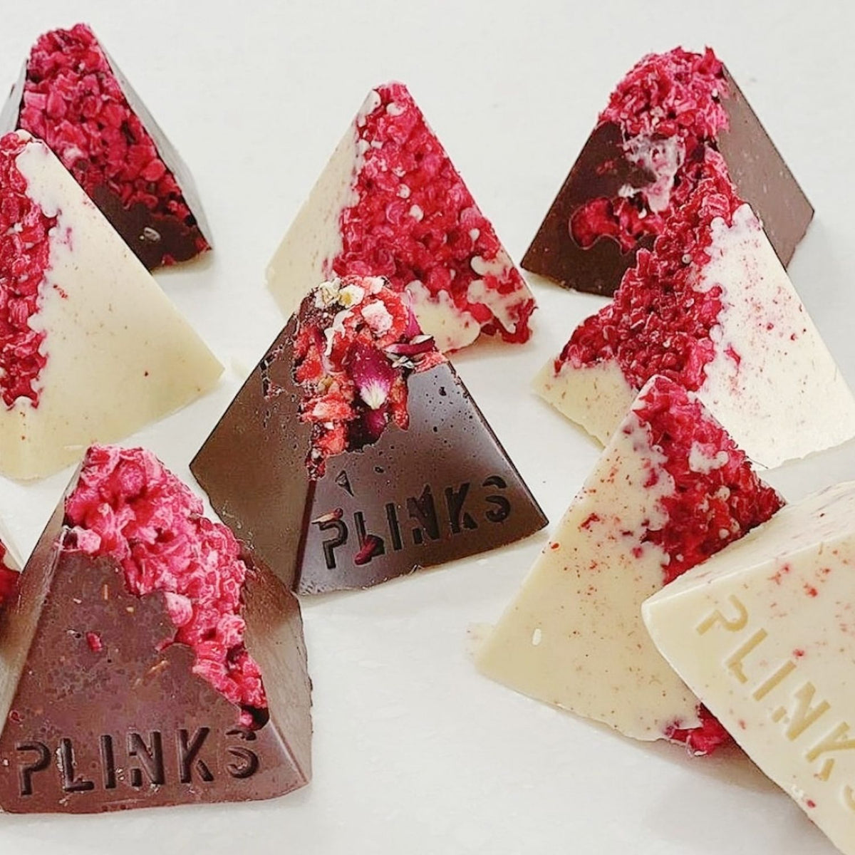 pyramid chocolate bars made with premium silicone pyramid ice cube tray, oven-safe up to 200°C. Perfect for unique ice, chocolates, or crafts.
