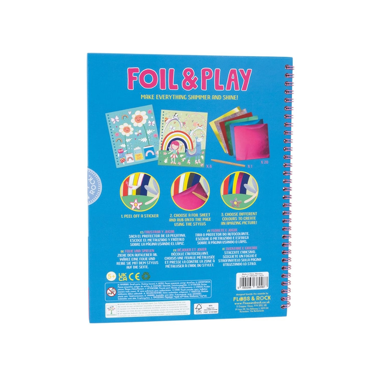 The back of the unicorn book displaying the FSC-certified logo and soy-based ink label with illustrations of fairies and rainbow. It includes a wooden stylus and color foiling sheets.