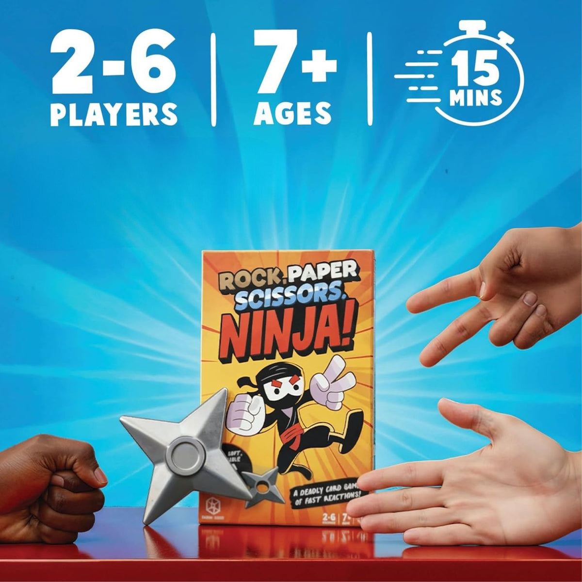 A high-impact display box for Rock Paper Scissors Ninja, featuring vibrant action-themed graphics, a clear window showcasing the foam ninja star, and the Format Games logo.