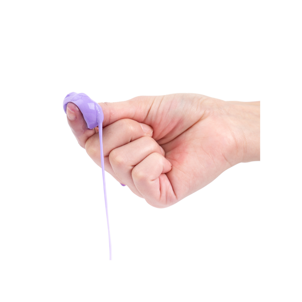 a hand squeezing purple throwable paintball