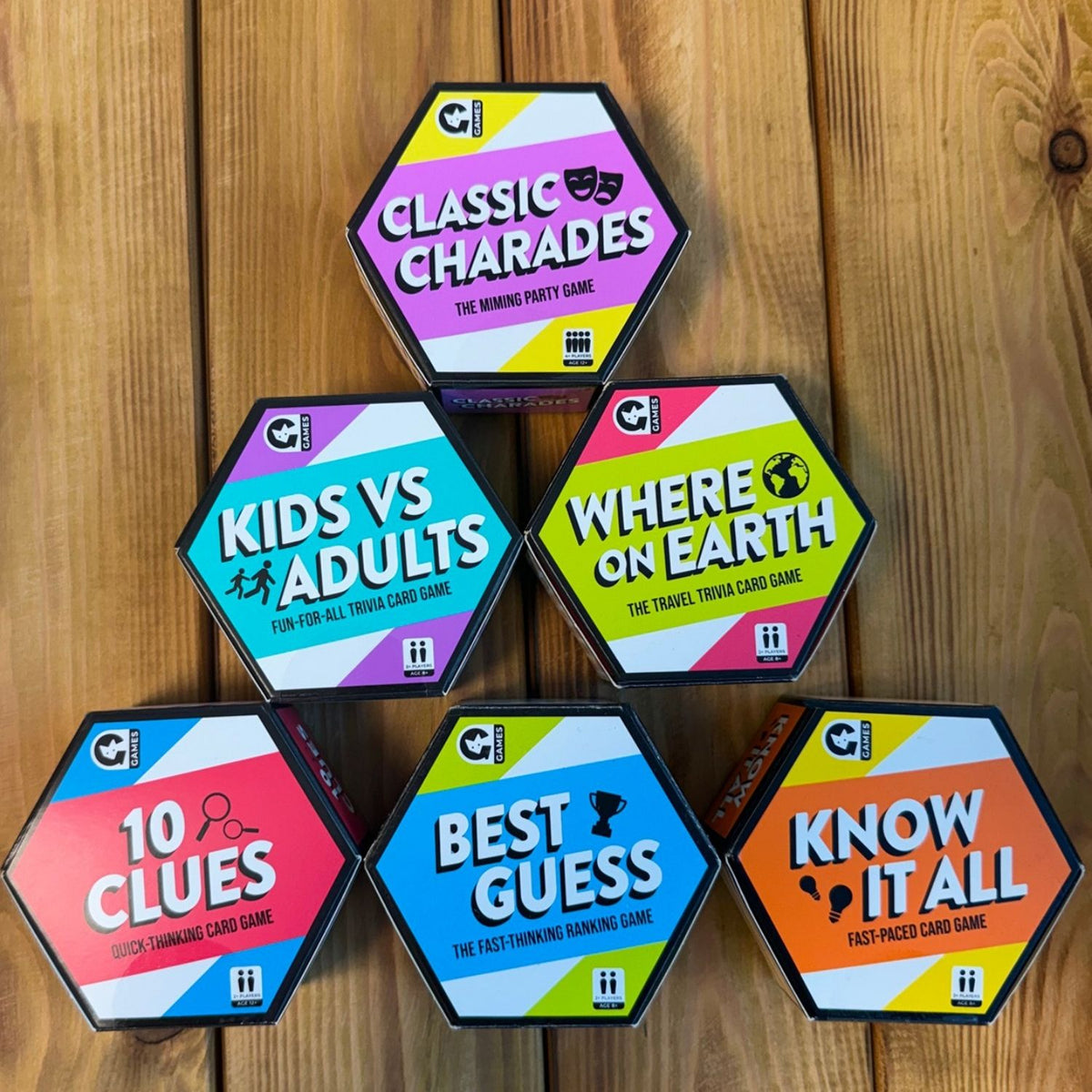 all hex games laid out on a wooden table 