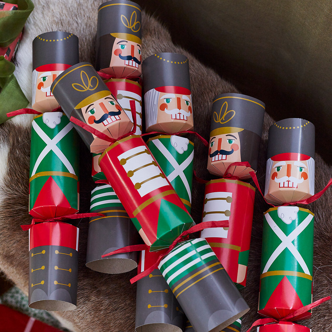 Botanical Nutcracker Christmas Crackers out of the box, laid on the table