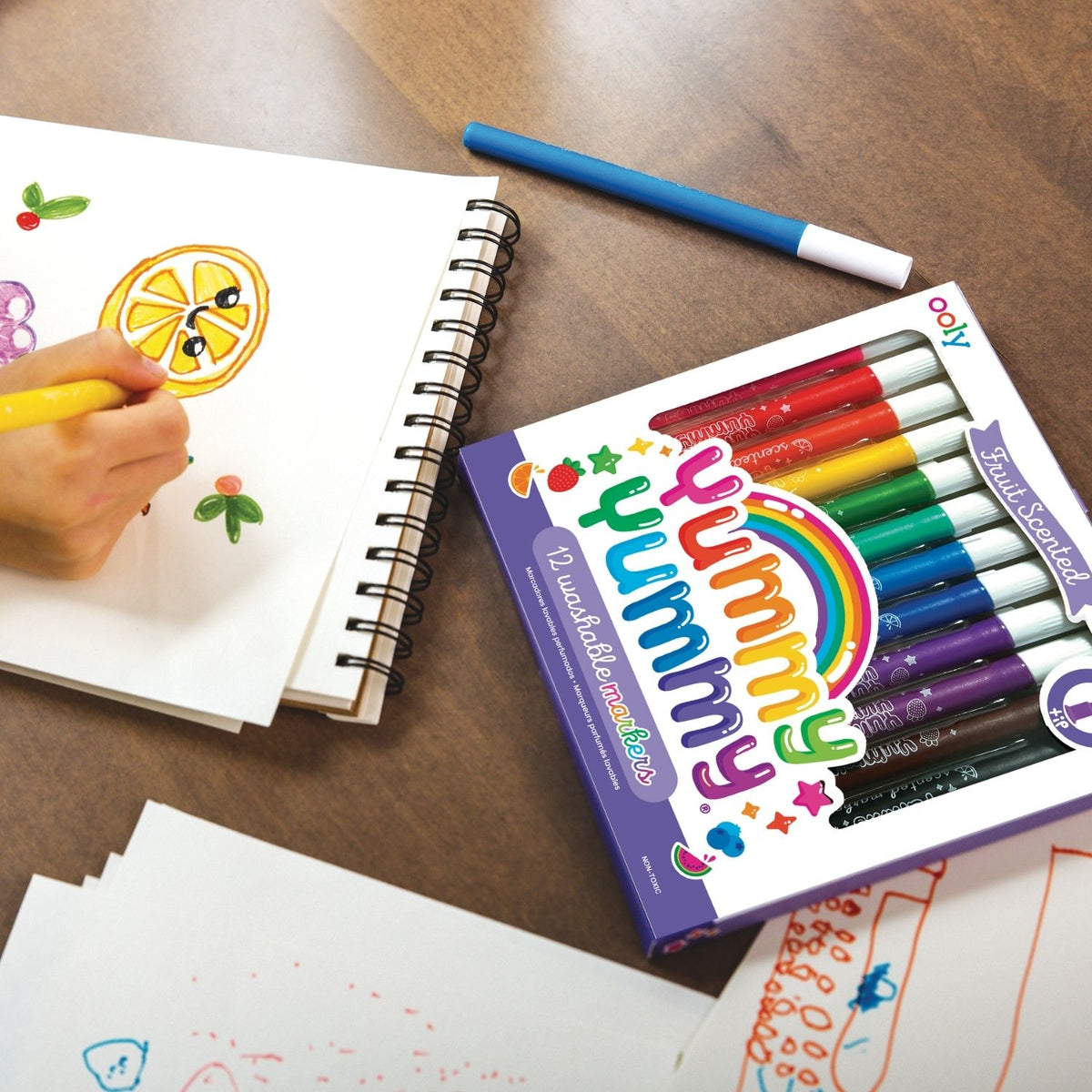 A child’s hand carefully drawing fine lines with the pointed tip, illustrating the control and precision the markers provide for early artists.