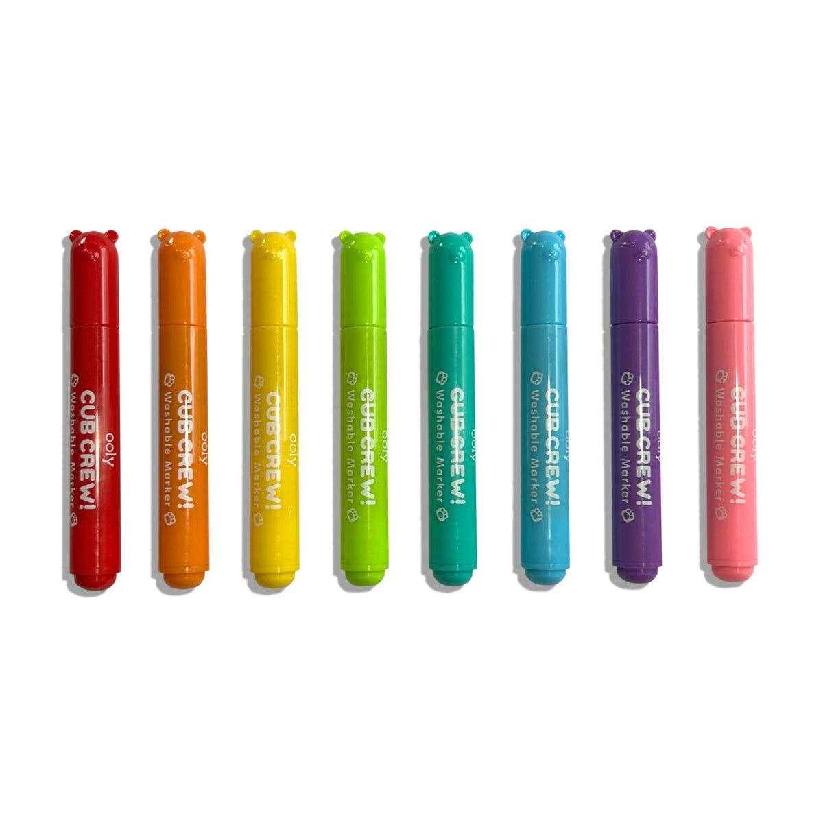 The 8 markers arranged in a row, showing the distinct bear-ear caps and the bold nibs ready for colouring.