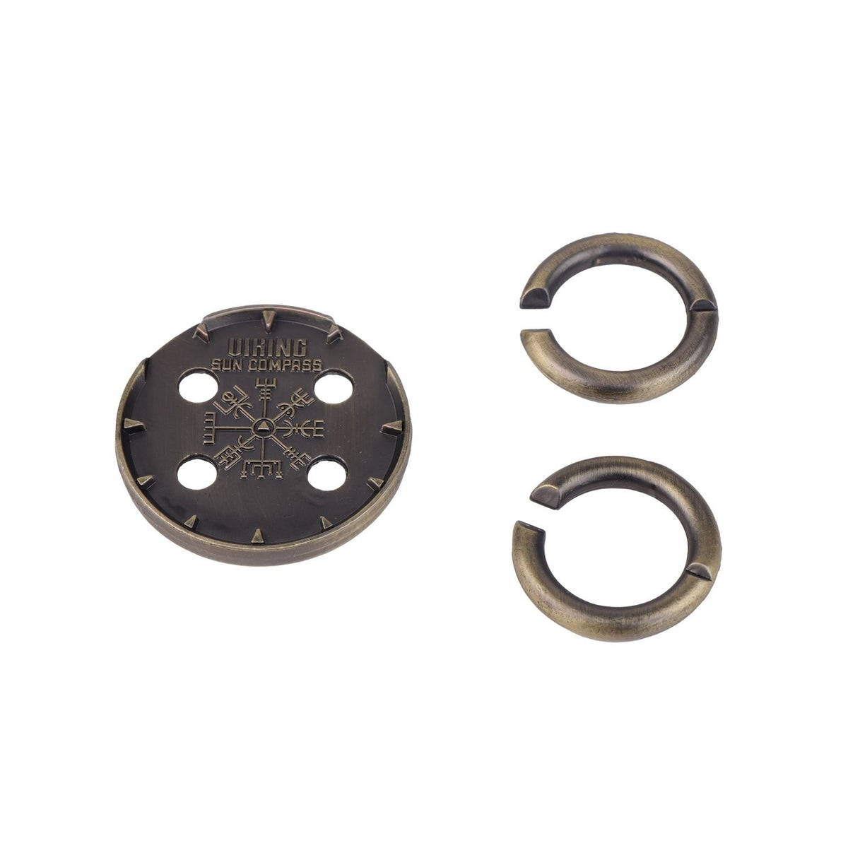 close up on compass puzzle pieces with the objective of disassembly. Inspired by ancient Viking solar navigation tools