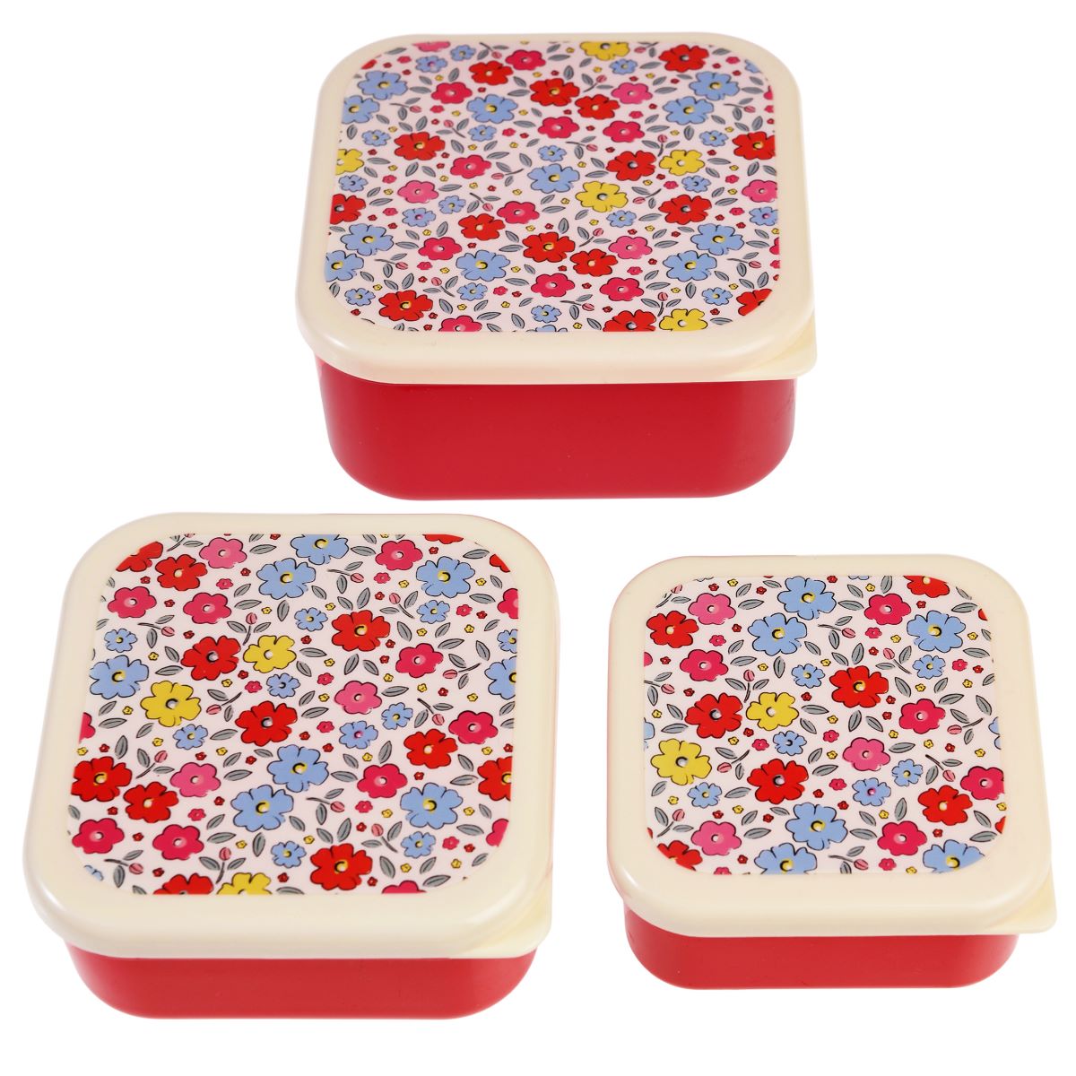Three snack boxes with floral patterns in different colors, made from recycled plastic.